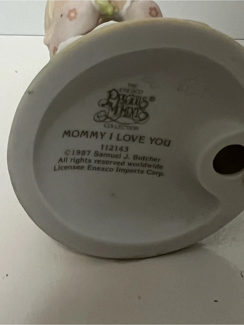 Vintage Precious Moments figurine titled “Mommy I Love You” from 1987